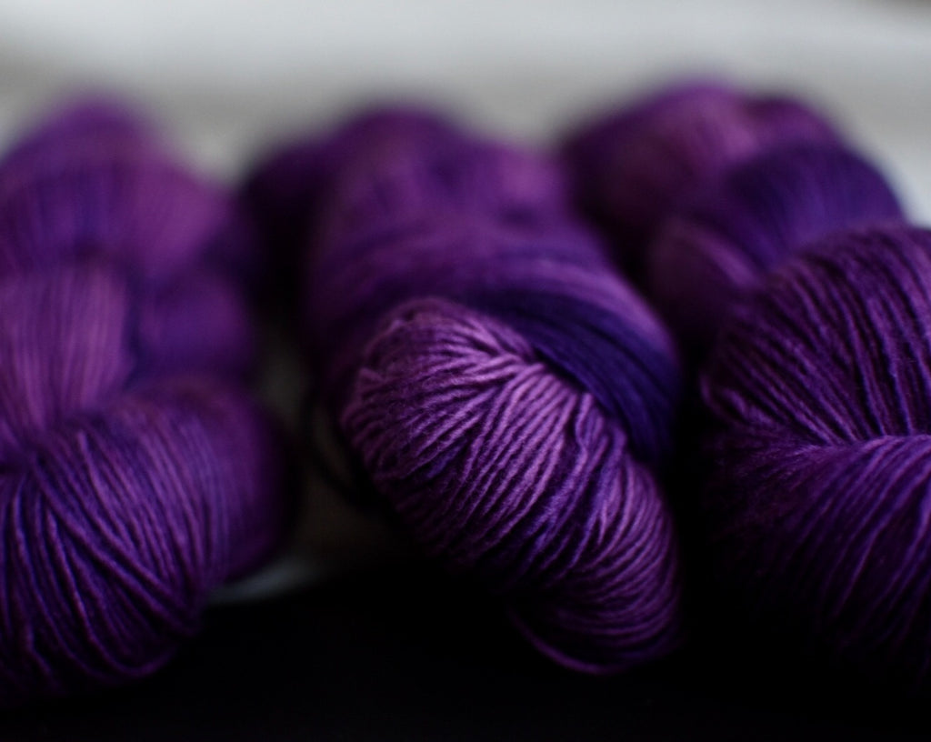 hand dyed yarn merino african violets purple verse yarns