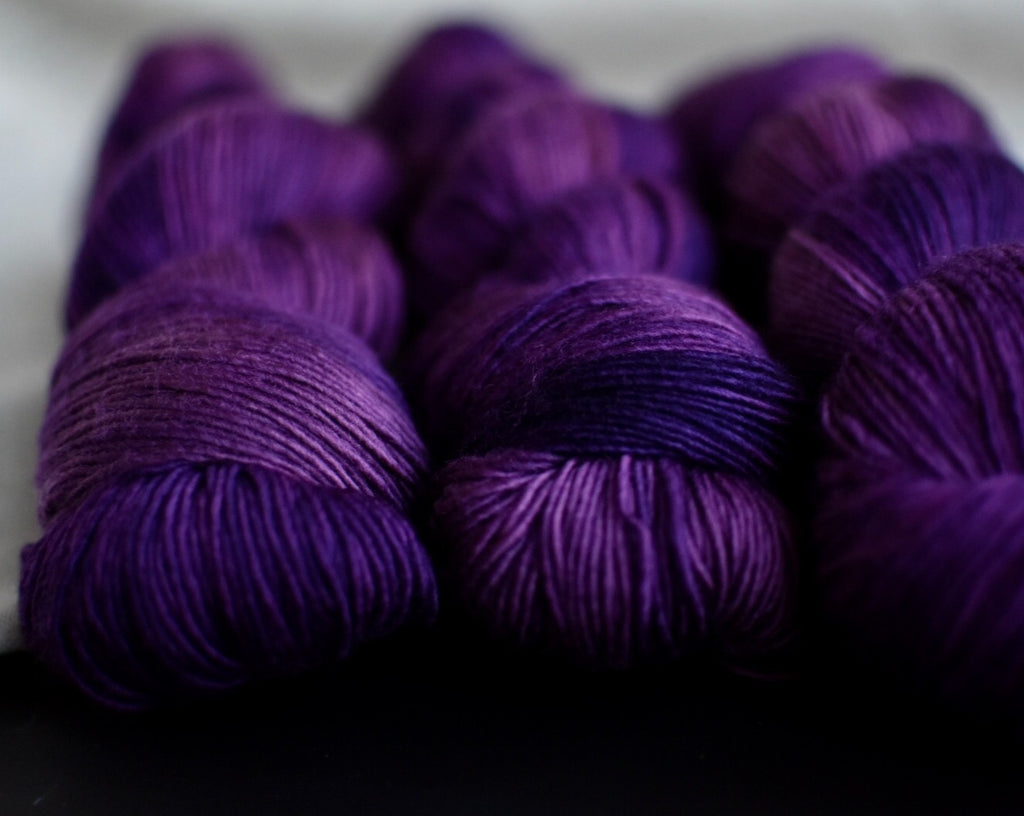 hand dyed yarn merino african violets purple verse yarns
