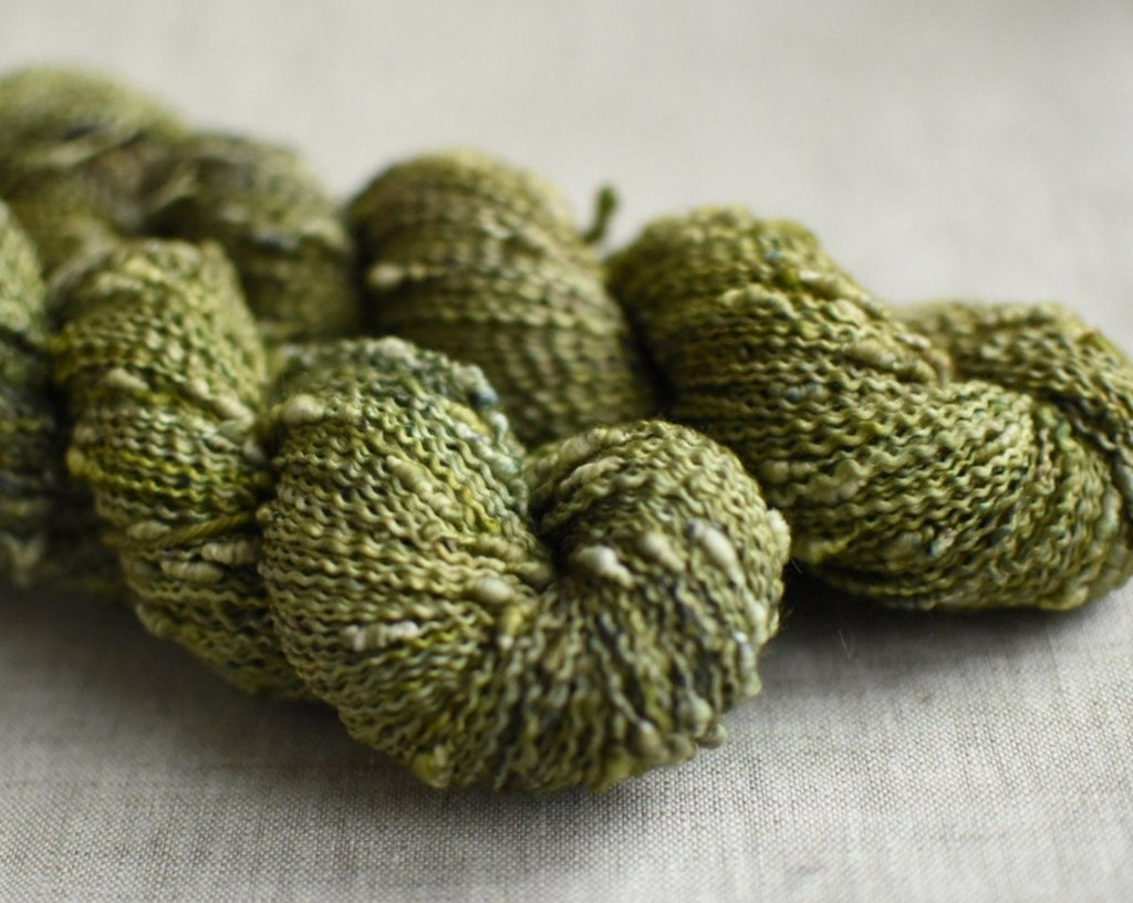 Fronds and tendrils hand dyed yarn slub merino green verse yarns