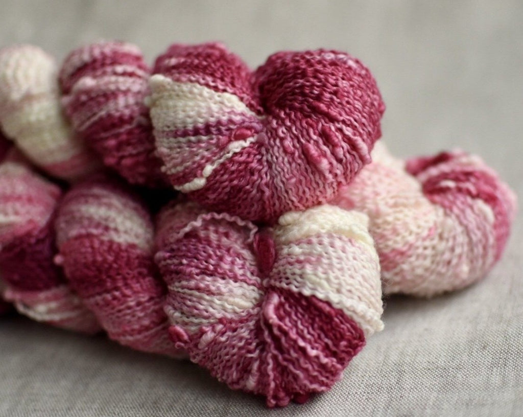 Camellia hand dyed yarn merino slub fingering red white and pink verse yarns