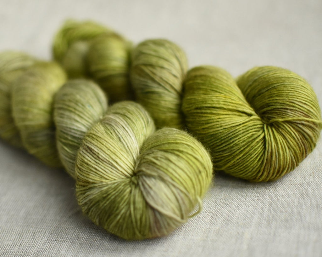 Fronds and tendrils hand dyed yarn single ply fingering merino green